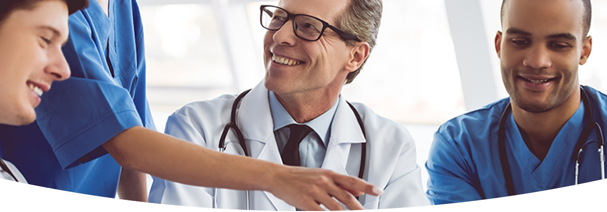 Healthcare professionals talking and laughing