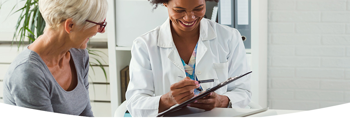 A patient talking with a healthcare professional